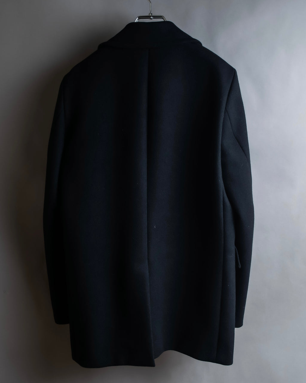 "JOHN LAWRENCE SULLIVAN"
 Large lapel double-breasted mid length coat