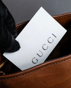 "GUCCI" Horizontally shaped cord-wrapped handle leather bag