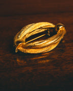 "Christian Dior" 70's Textured gold tone brooch