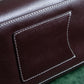 "HAMANO TOKYO" Trapezoidal shape iconic hardware leather one handle bag