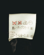 旧JIS系の洗濯表示と、東レ・ディプロモードの取扱表記を確認できる内側タグのカット。1990年代後半から2000年代初頭頃の個体推定に関わるディテールです。