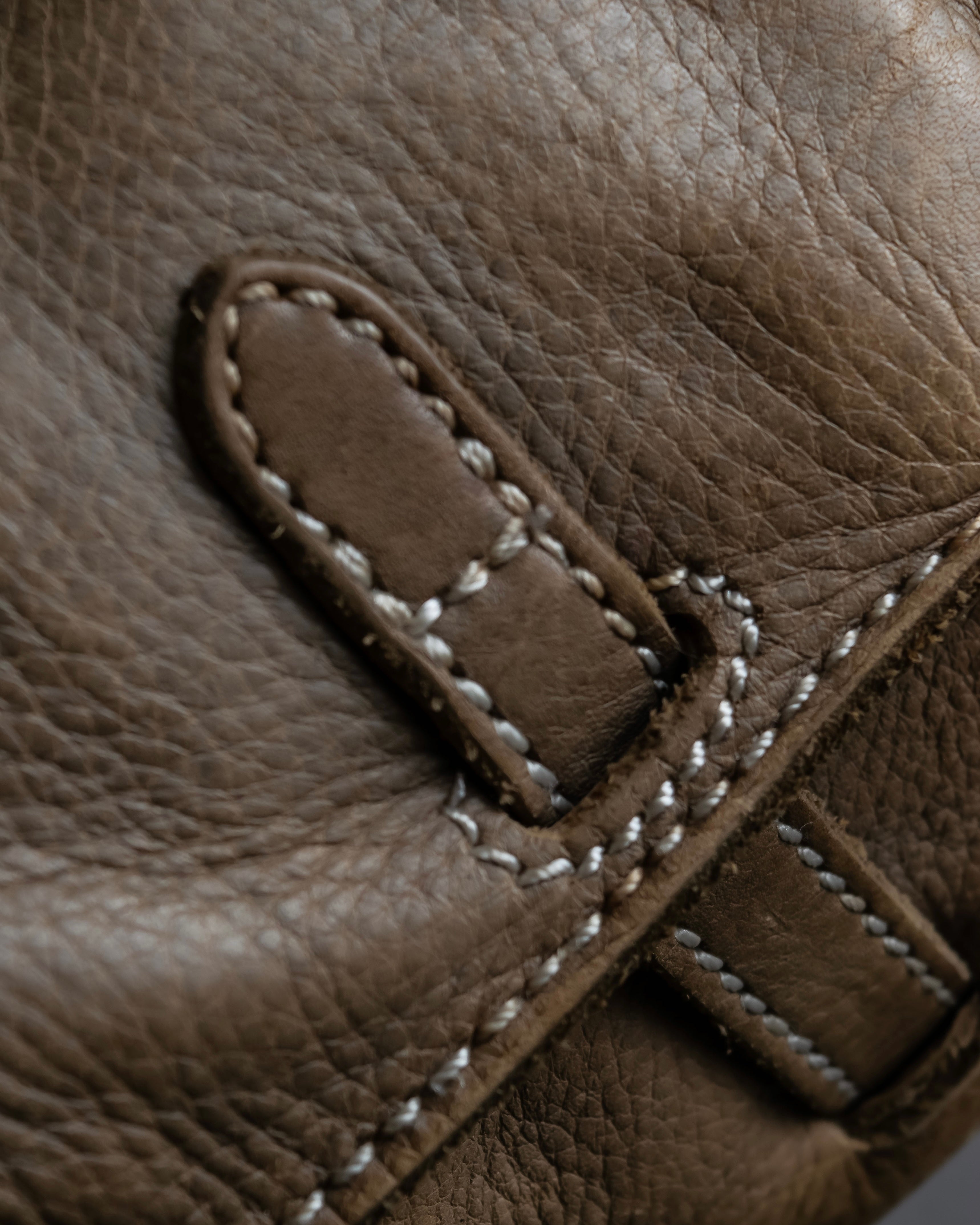 "Mademoiselle Accessories"
 Silver parts design leather one handle bag