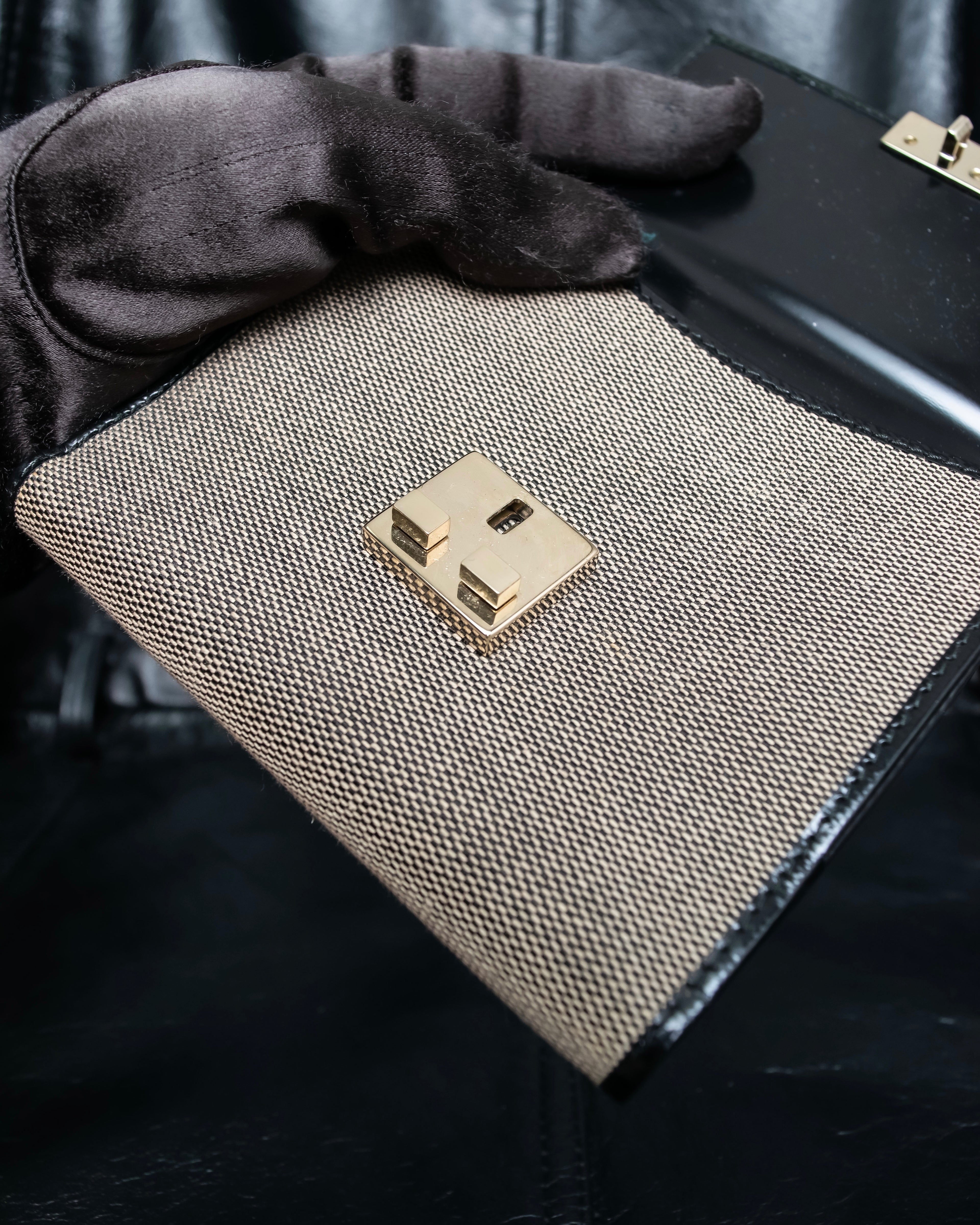 "GUCCI" Canvas and leather bi-fold wallet