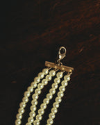 –SPECIAL– “Christian Dior” 2018-2025 Four-strand faux pearl bracelet with sculptural oval accents