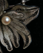 "Vintage petal motif broach"