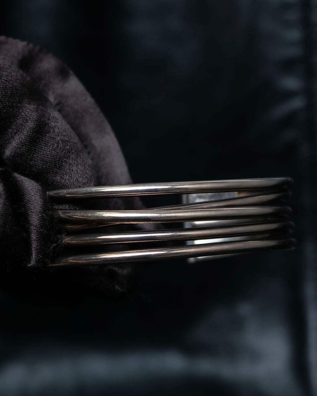 “PHILIPPE AUDIBERT” Crossed 5 line silver bangle