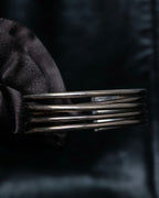 “PHILIPPE AUDIBERT” Crossed 5 line silver bangle