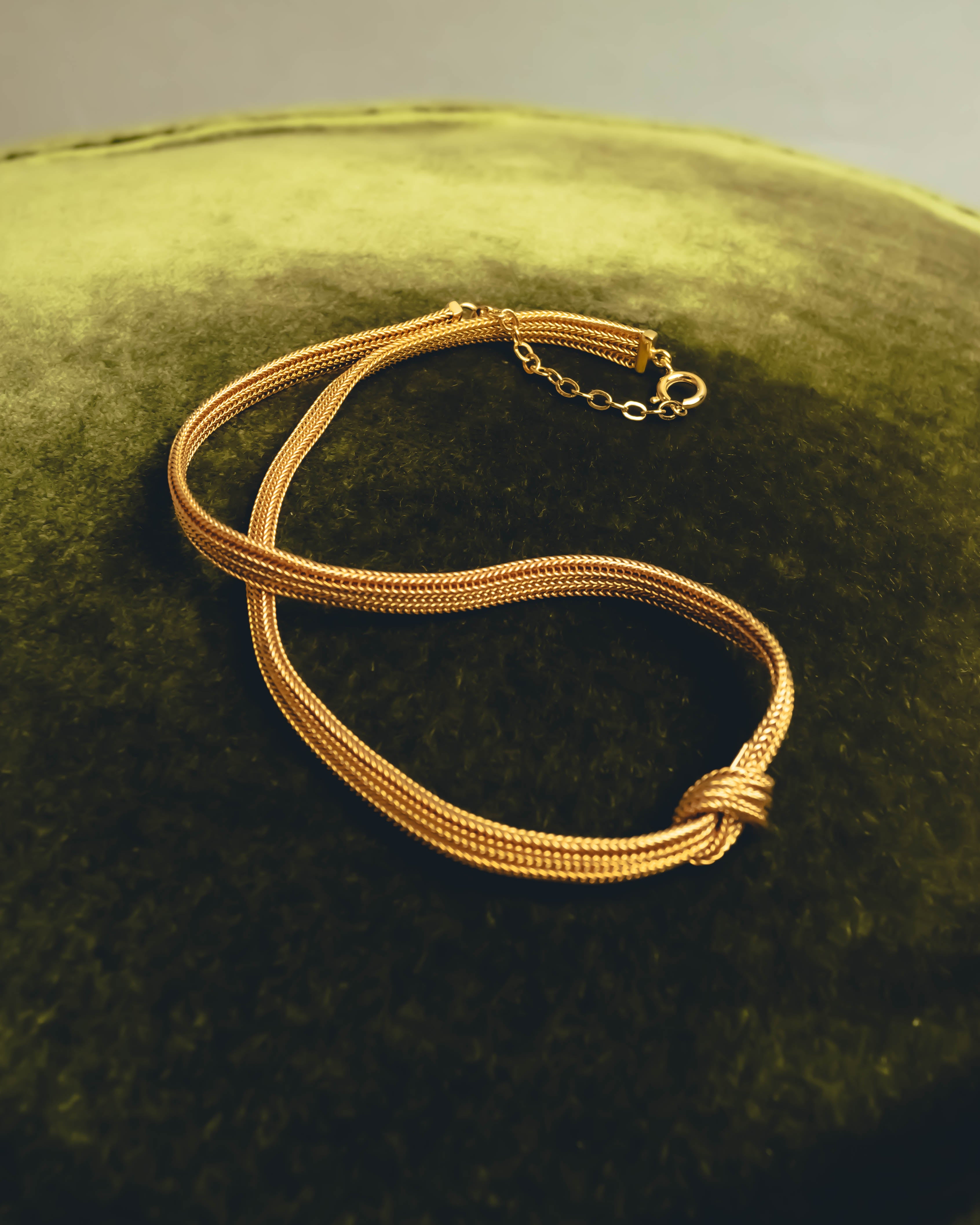"Christian Dior" Gold tone braided knot costume jewelry necklace