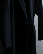 Tight-waisted wool shirt and black coat