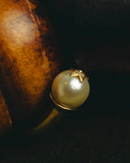 "DIOR" 10's-20's Gold tone pearl star open bangle