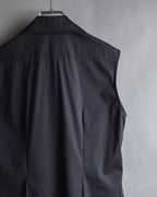 "Yves Saint Laurent Rive Gauche"
Twisted front sleeveless shirt