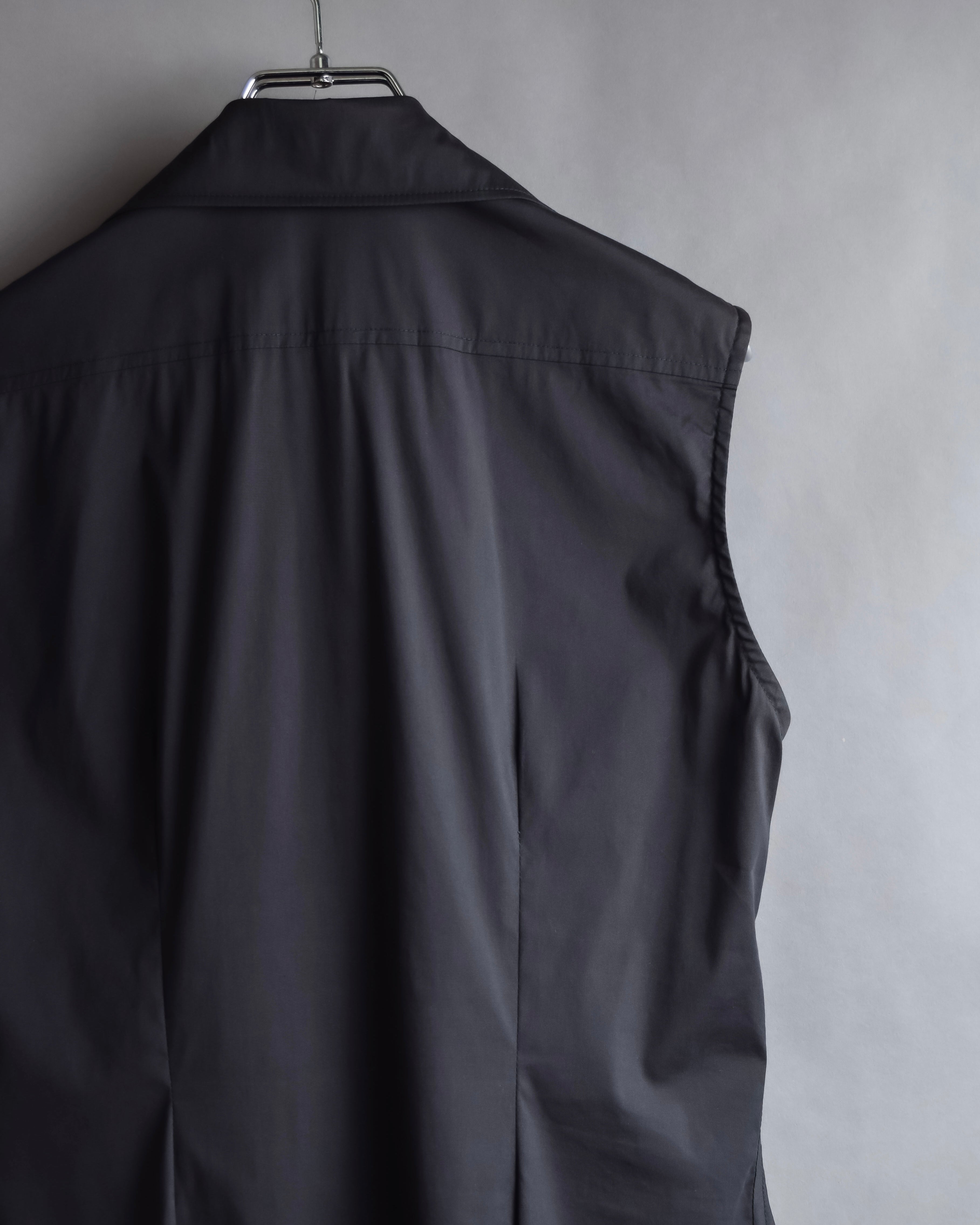 "Yves Saint Laurent Rive Gauche"
Twisted front sleeveless shirt