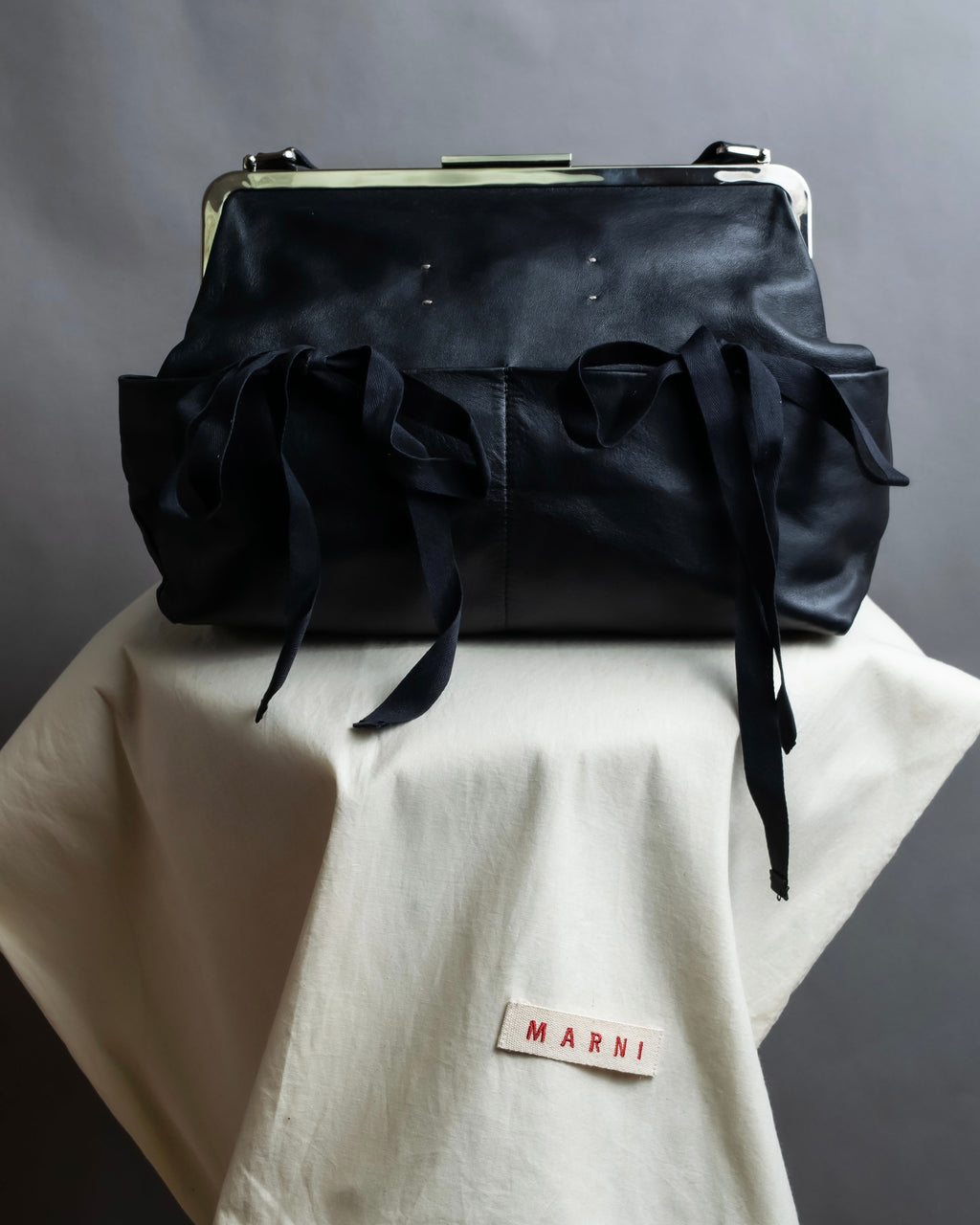 "MARNI" Side ribbon design rounded body leather bag
