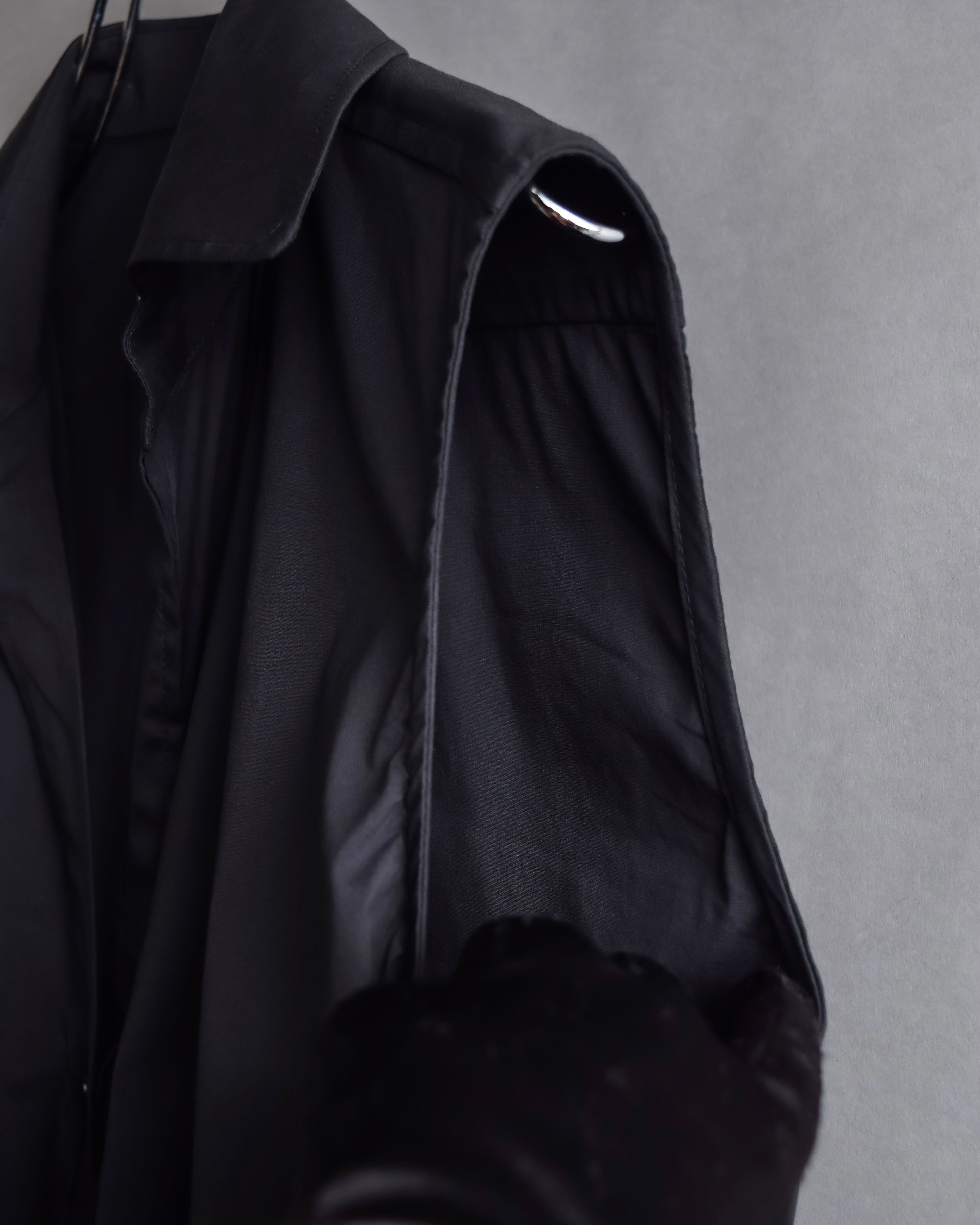 "Yves Saint Laurent Rive Gauche"
Twisted front sleeveless shirt