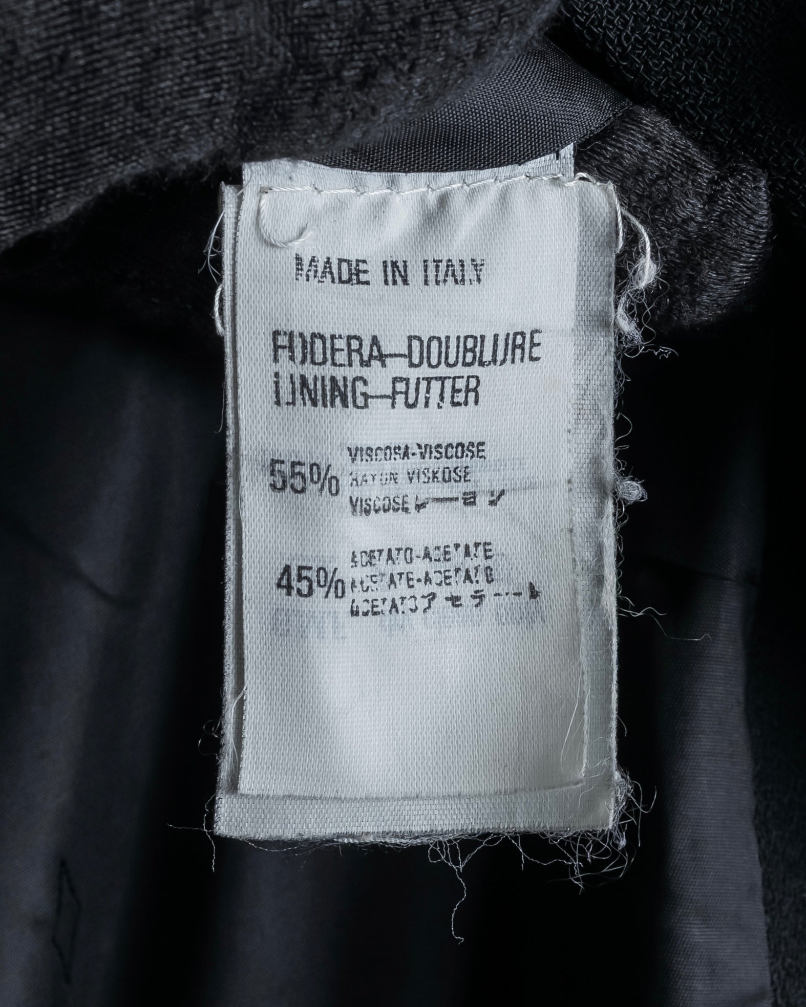 "GIANFRANCO FERRE" Multiple button sequences shaped long coat