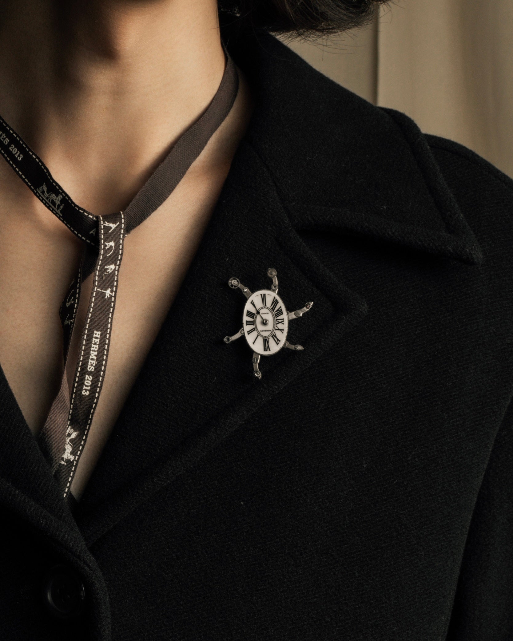 "Jerry Robertson design clock motif brooch"