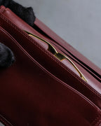 "Cartier" Les Must de Cartier bordeaux color leather wallet