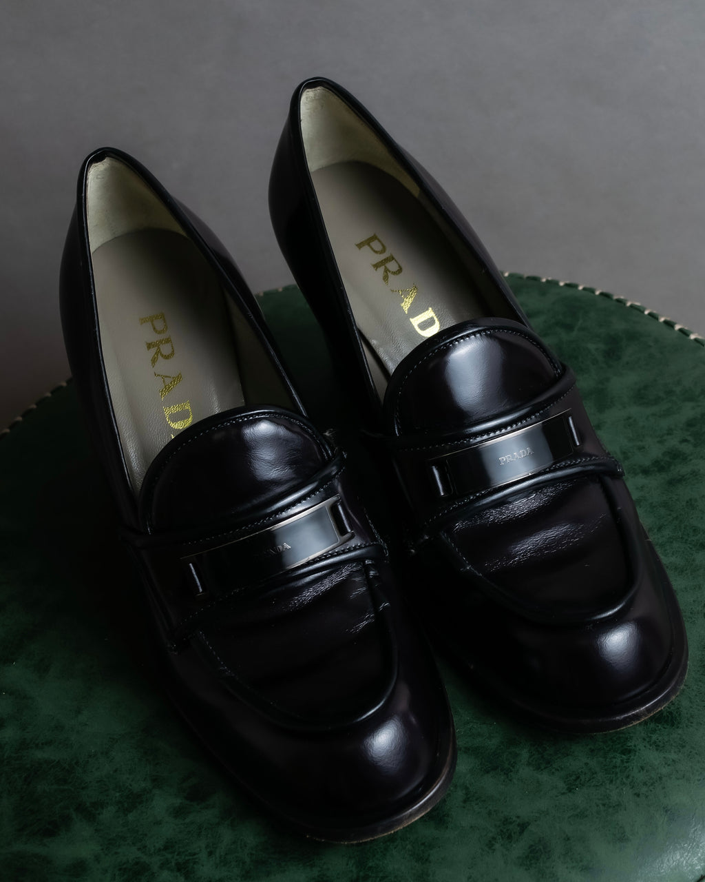 "PRADA" Metal band design leather heel loafers