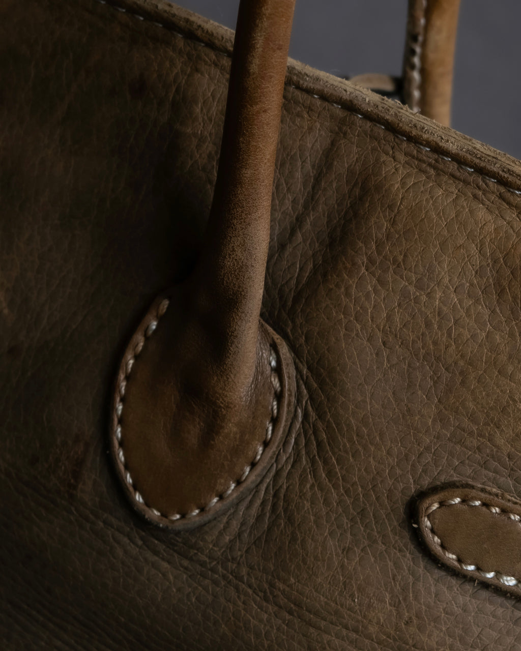 "Mademoiselle Accessories"
 Silver parts design leather one handle bag