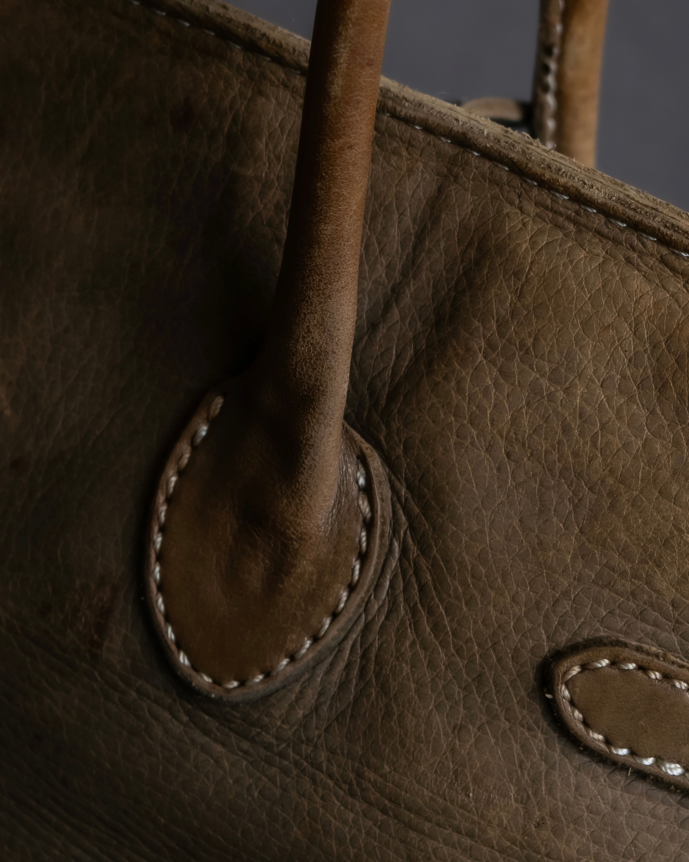 "Mademoiselle Accessories"
 Silver parts design leather one handle bag