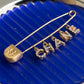 "CHANEL" Logo motif gold safety pin brooch