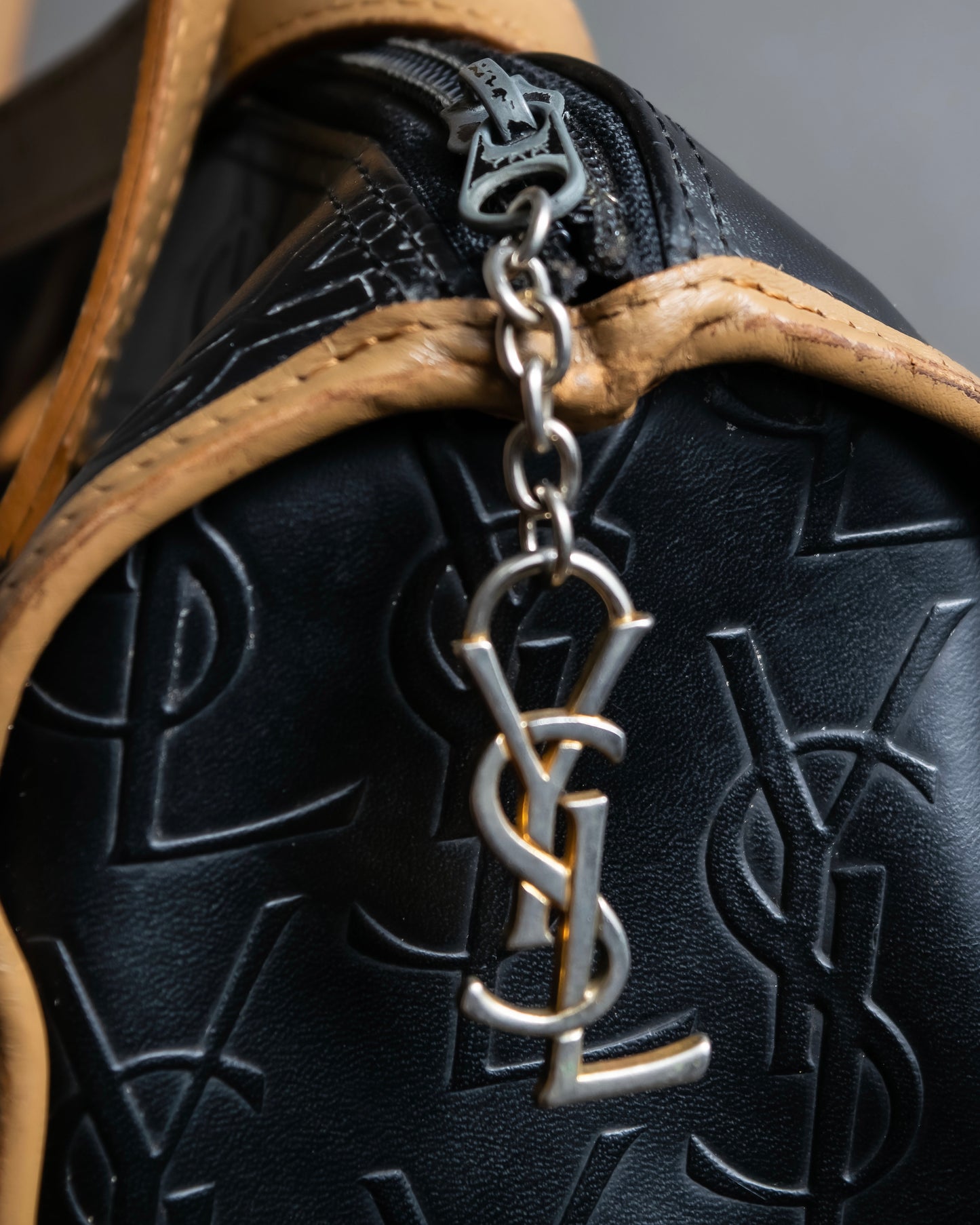 "YVES SAINT LAURENT" Logo engraved bicolor leather boston bag