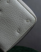 "MAISON MARGIELA" White grain leather round zipper wallet