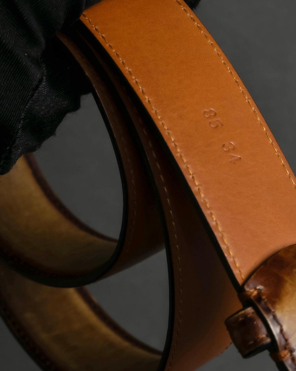 "Berluti" Patina finish curved buckle leather belt