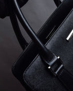 "BURBERRY" Trapezoidal embossed leather one-handle bag