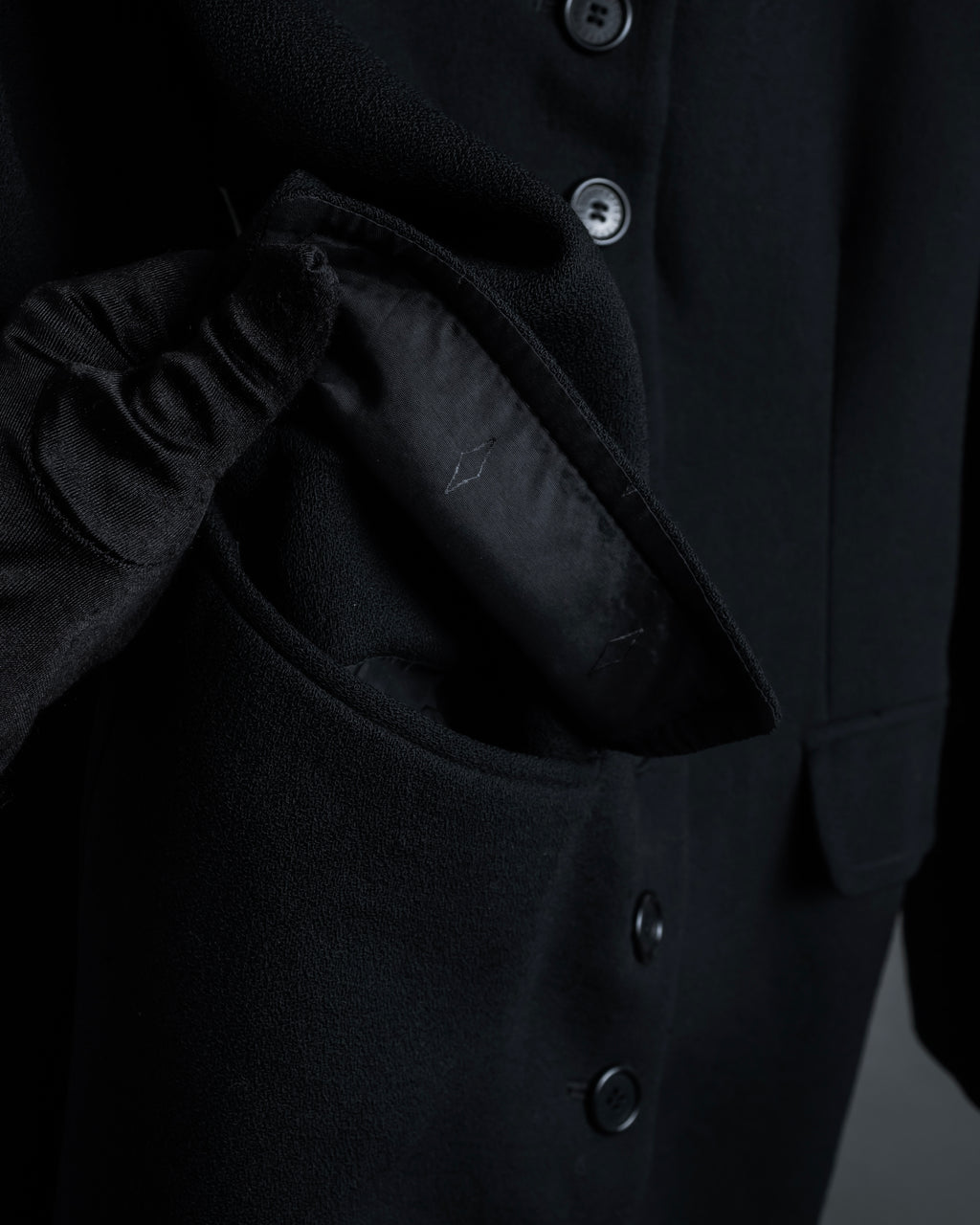 "GIANFRANCO FERRE" Multiple button sequences shaped long coat