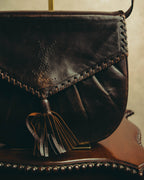 “Yves Saint Laurent” 70’s-80’s Perforated logo leather tassel shoulder bag