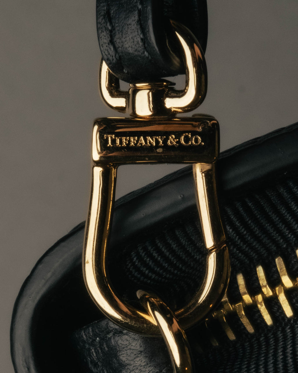 "Tiffany & Co." 10's-20's Embossed leather wristlet wallet