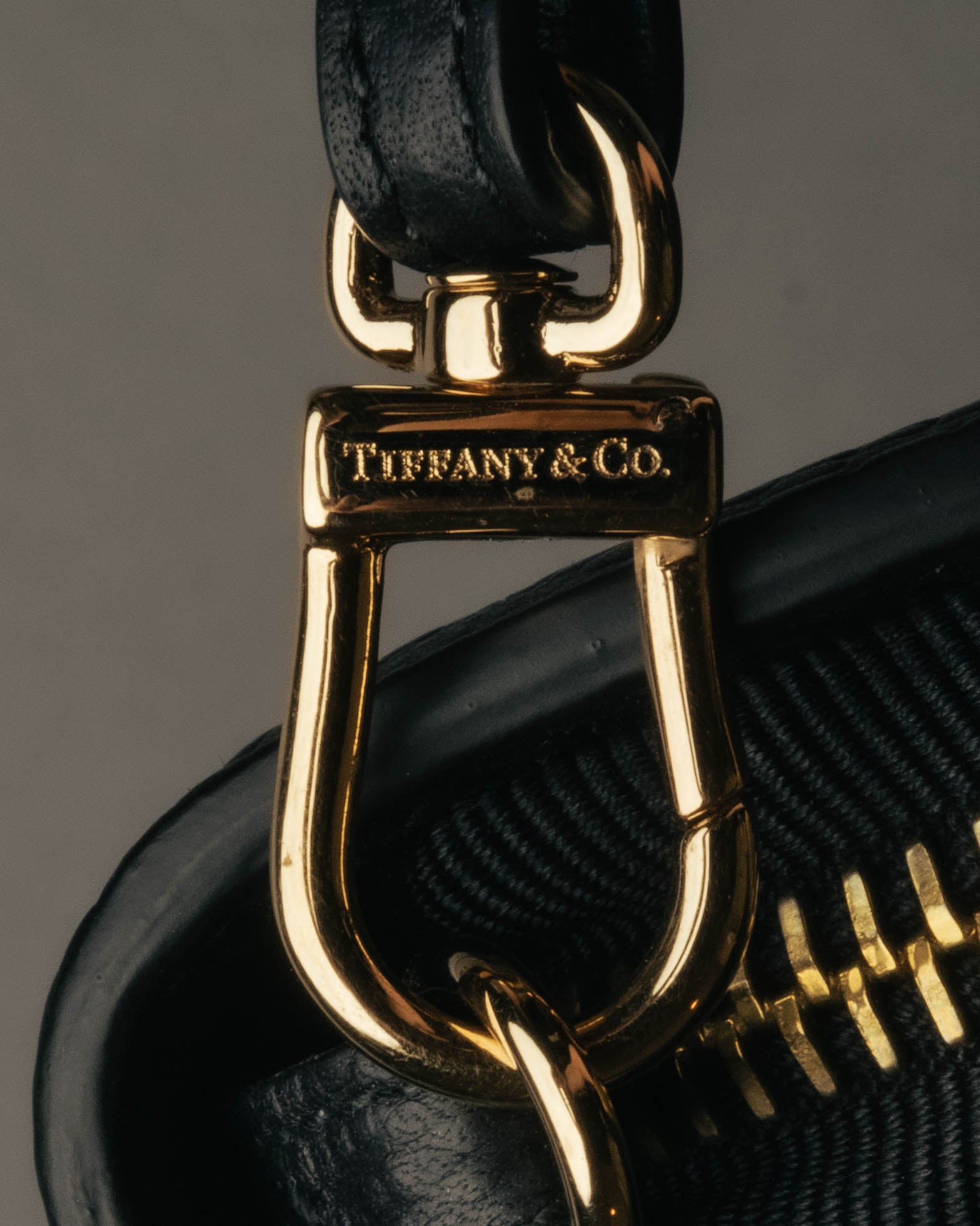 "Tiffany & Co." 10's-20's Embossed leather wristlet wallet