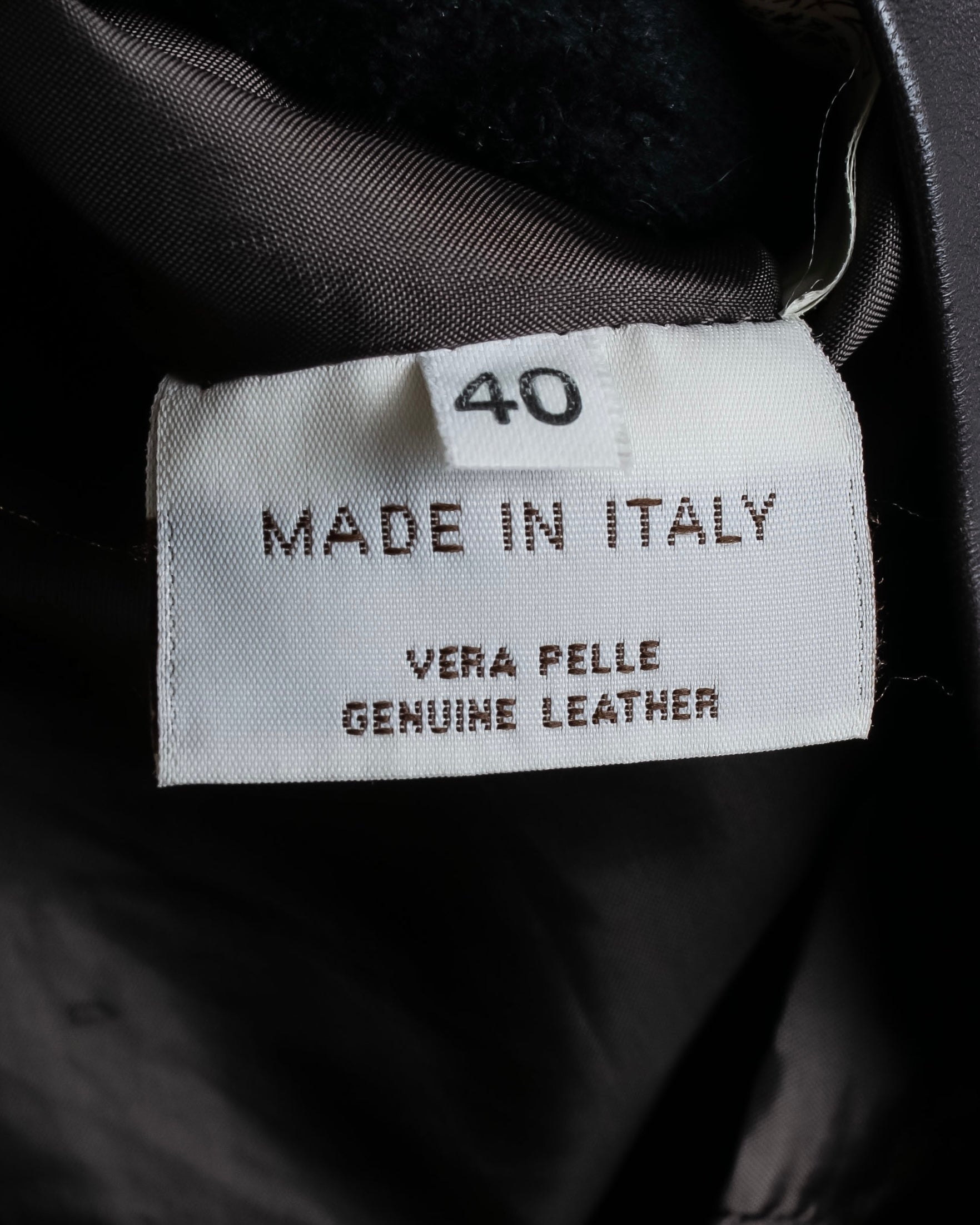 "HARVEY LOGAN" Diagonal cut design lamb leather flare skirt