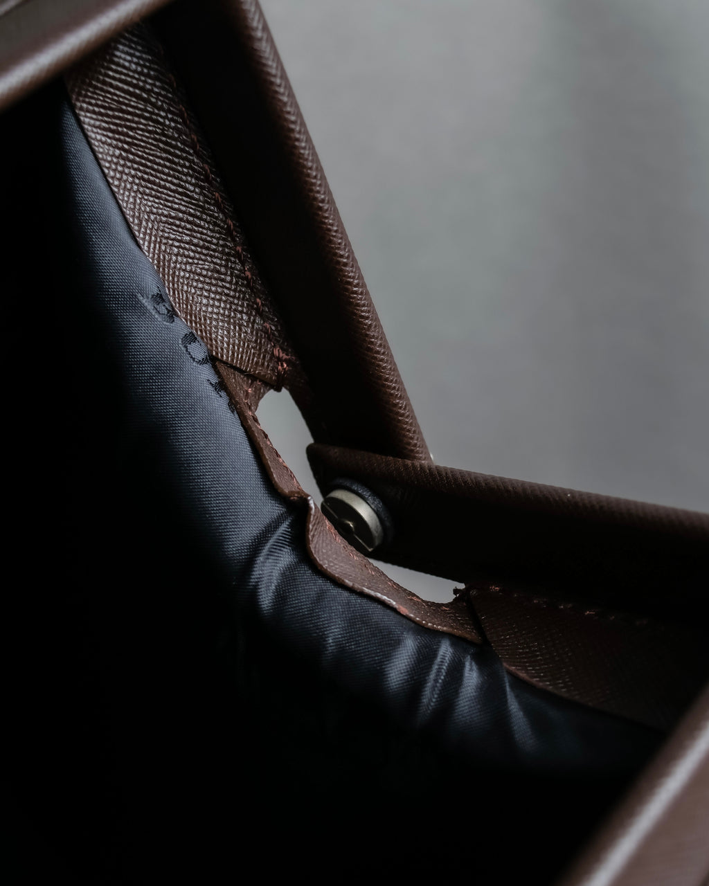 "BURBERRY" Metal belt design embossed PVC briefcase