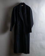 Tight-waisted wool shirt and black coat