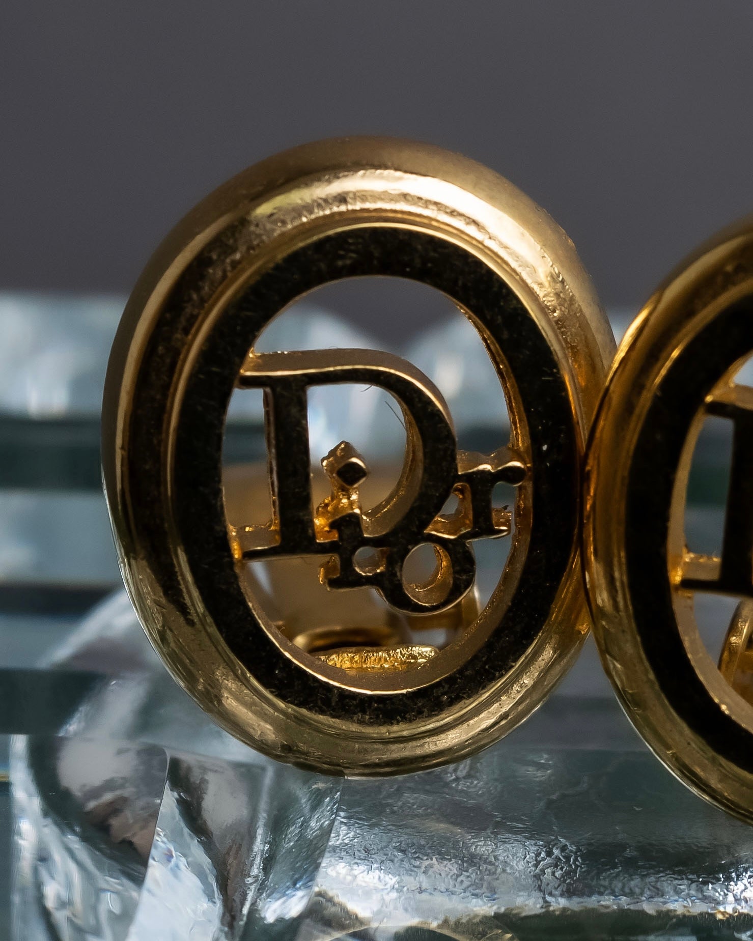 "Christian Dior" Logo cutout design gold earrings