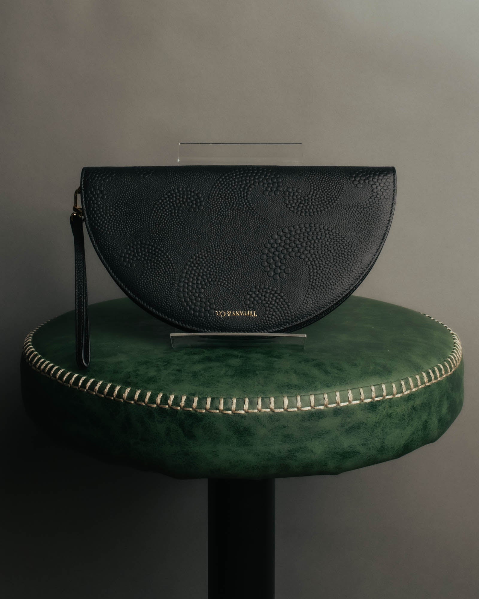 "Tiffany & Co." 10's-20's Embossed leather wristlet wallet