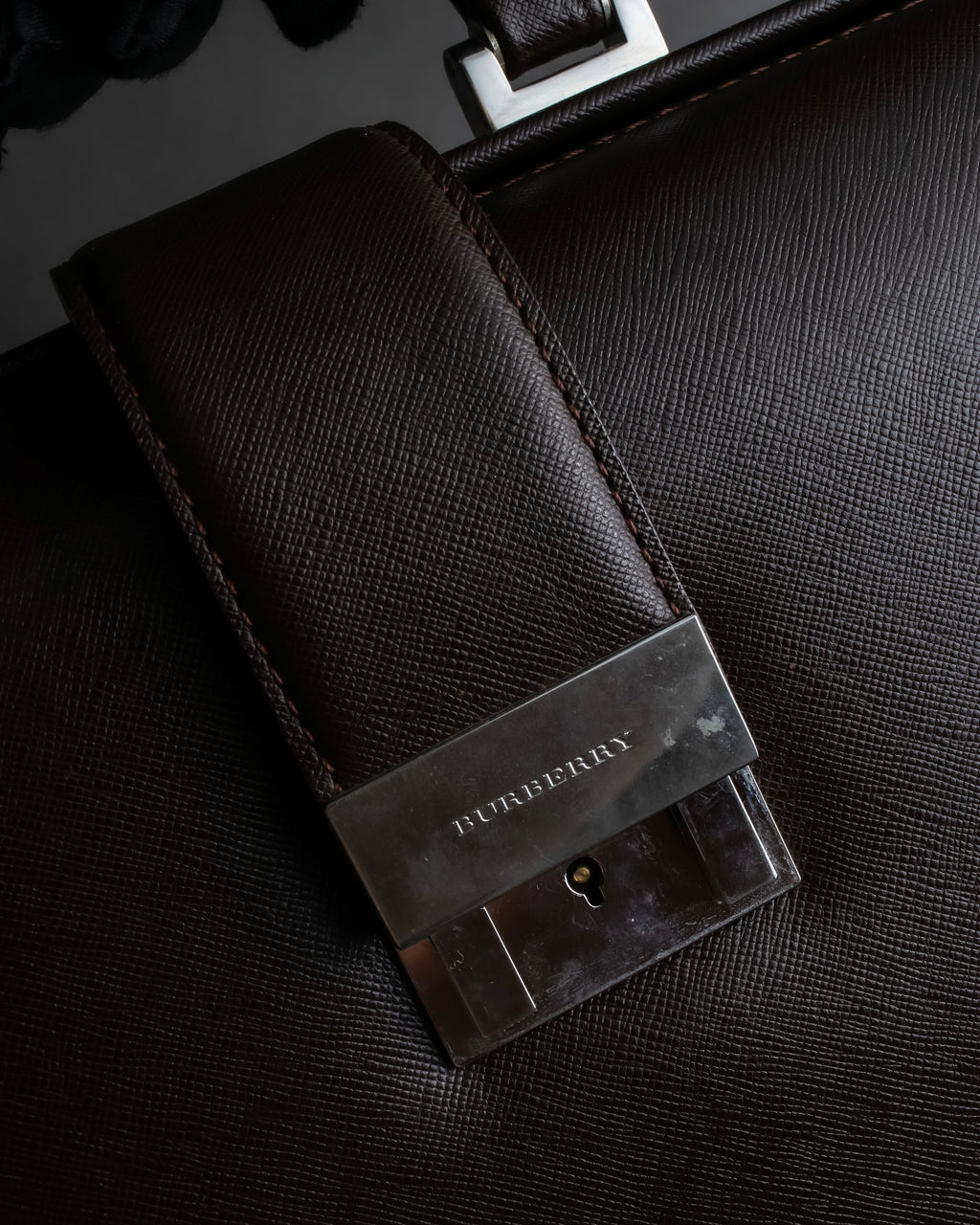 "BURBERRY" Metal belt design embossed PVC briefcase