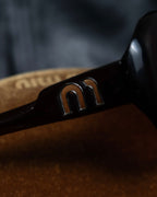 "Miu Miu" reddish brown sporty sunglasses