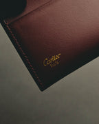 “Cartier” 90’s Must de Cartier burgundy embossed leather bifold wallet