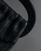 "BURBERRYS" Oval buckle design, supple leather belt