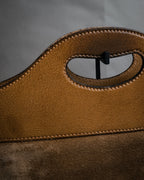 “GUCCI” Late 70’s-early 80’s suede and leather cutout handle bag