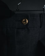 "CHANEL" high-waisted pleated trousers with signature gold button