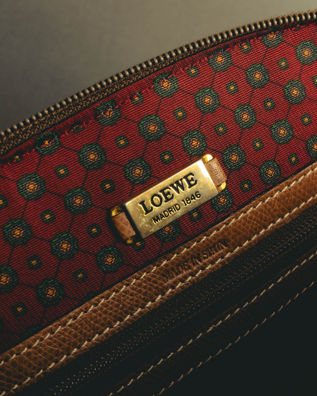 "LOEWE" 80s–00's logo embossed leather handbag