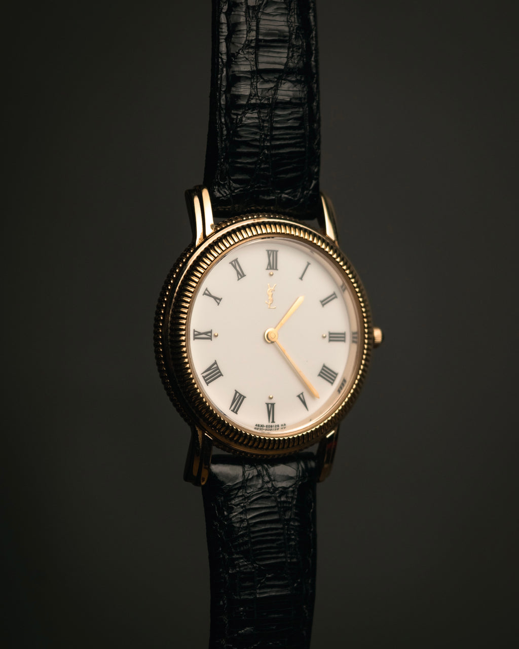“Yves Saint Laurent” 80’s-90’s coin edge quartz leather watch