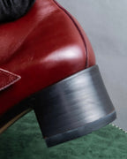 "tricot COMME des GARCONS"
 Belted heel leather pumps