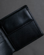 "YVES SAINT LAURENT" Cassandra logo engraved leather bi-fold wallet