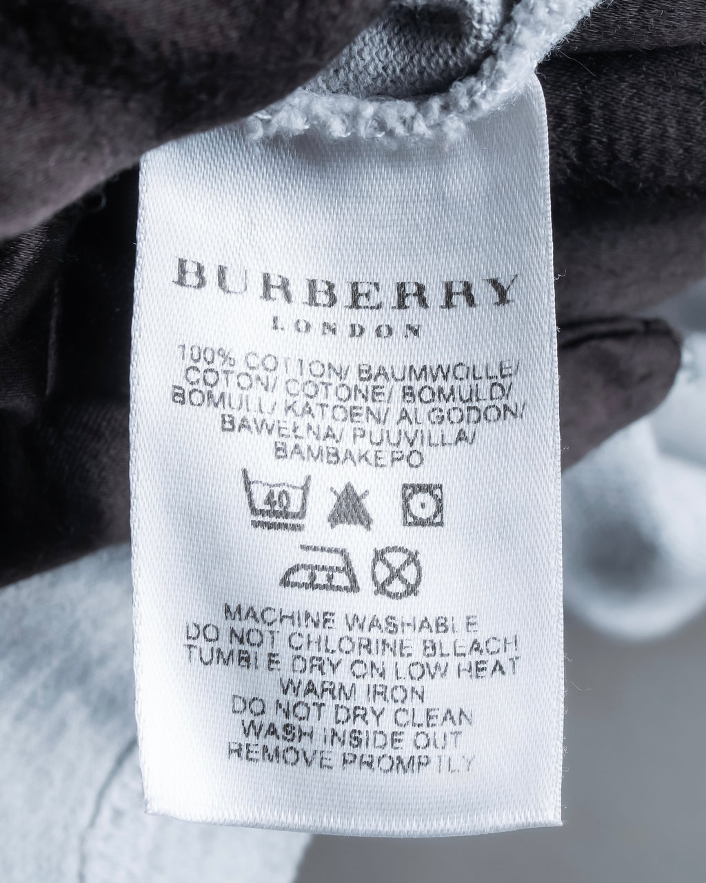 "BURBERRY" Knight logo engraved metal button polo shirt