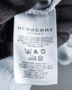 "BURBERRY" Knight logo engraved metal button polo shirt